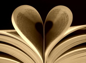 "Heart-shaped image formed by book pages"